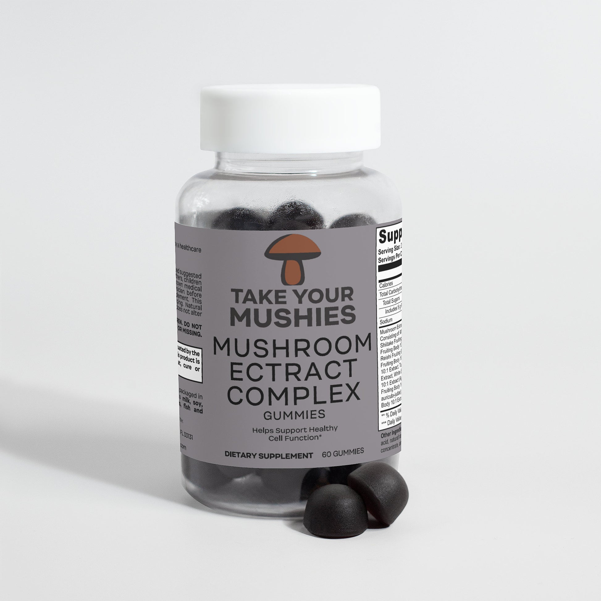 Bottle of 'Take Your Mushies' mushroom extract complex gummies on a light gray background