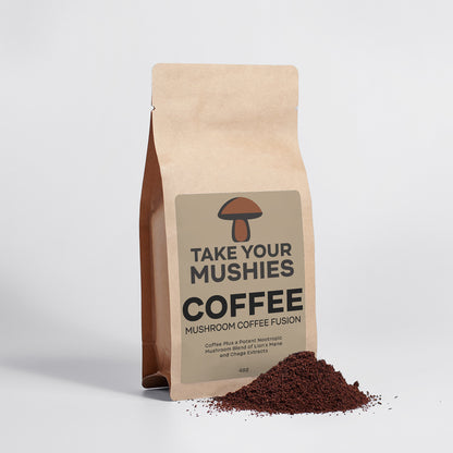 Coffee bag labeled 'Take Your Mushies Coffee' with mushroom graphic on a light gray background