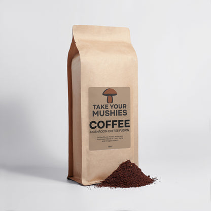 Bag of 'Take Your Mushies Coffee' with coffee grounds spilling out on a light gray background